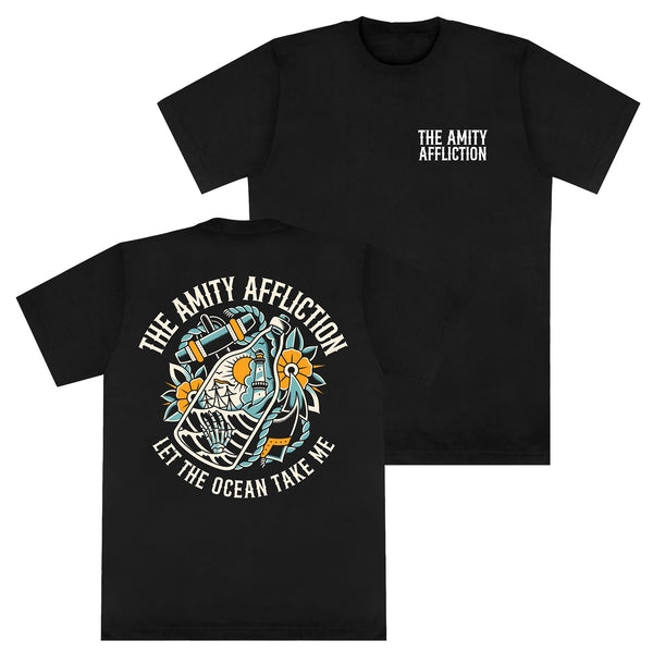 Black Comfort Colors T-shirt by The Amity Affliction with band text on the front left chest; back print features a skeleton hugging an anchor with flowers, plus "THE AMITY AFFLICTION" and "LET THE OCEAN TAKE ME" text.