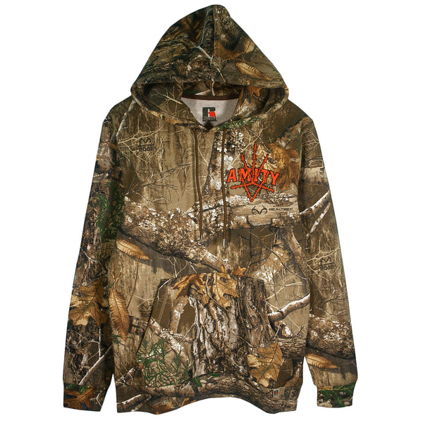 This Russell Outdoors hoodie, by The Amity Affliction, features a camouflage forest pattern, bold orange "AMITY" lettering with a trident graphic, a front pocket, and classic hooded comfort.