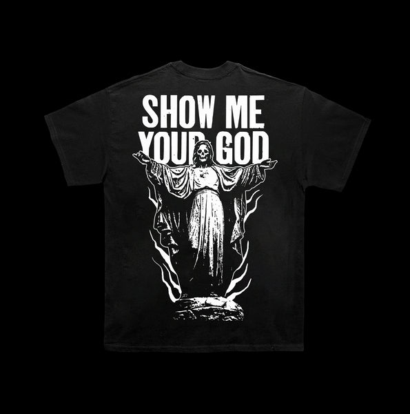 image of the back of a black tee shirt. tee has full print in white that says show me your god with a skeleton angel 