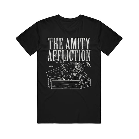 image of a black tee shirt on a white background. front of the tee has a full chest print in white of a grim reaper coming out of a coffin. across the top says the amity affliction