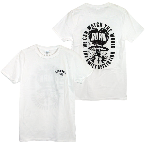Image of the front and back of a white tshirt against a white background. The left chest says doomsday in black text a semi circle shape. Below that is a small rectangle and inside it says TAA and next to that is a radiation hazard symbol. The back of the shirt has a graphic of a mushroom cloud explosion, and shows two people looking at each other. Wrapping around this graphic in black text says The Amity affliction. we can watch the world. The center of the mushroom cloud in white says Burn. 